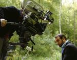 Jean Dujardin sous la camera de Franck Mancuso. Photo de tournage 