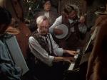 est le pianiste du saloon dans 3 Godfathers (1948) de John Ford pour lequel il a également composé la musique.