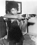 est une des icone de la Blaxploitation (courant culturel et social propre au cinéma américain des années 1970 qui a revalorisé l'image des afro-américains) dans Coffy (1973) de Jack Hill